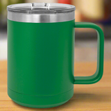 Green insulated mug with a handle on a 