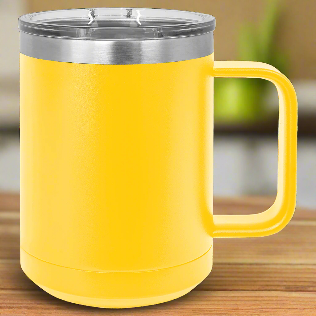 Yellow insulated mug with a handle on a 
