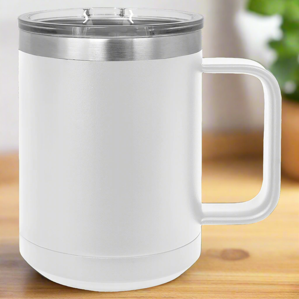 White insulated mug with a clear lid on a 